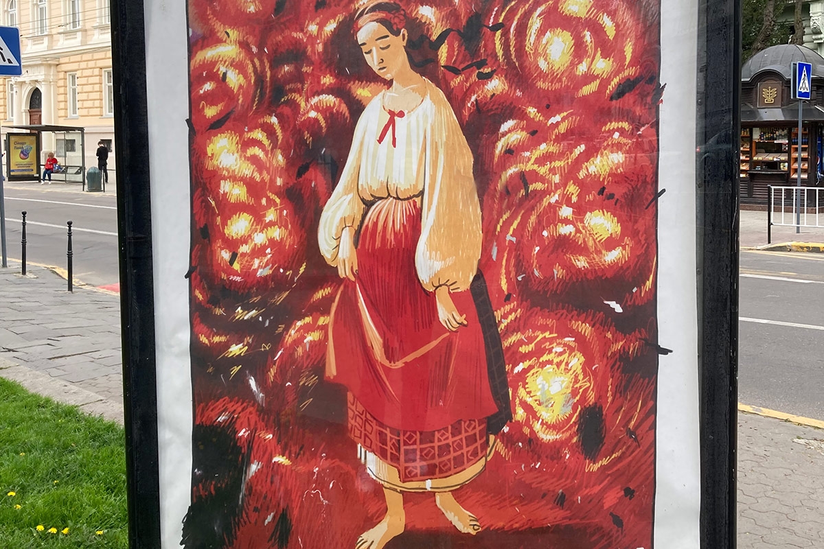 Plakat in Lwiw zeigt die Ukraine als Frau in Tracht