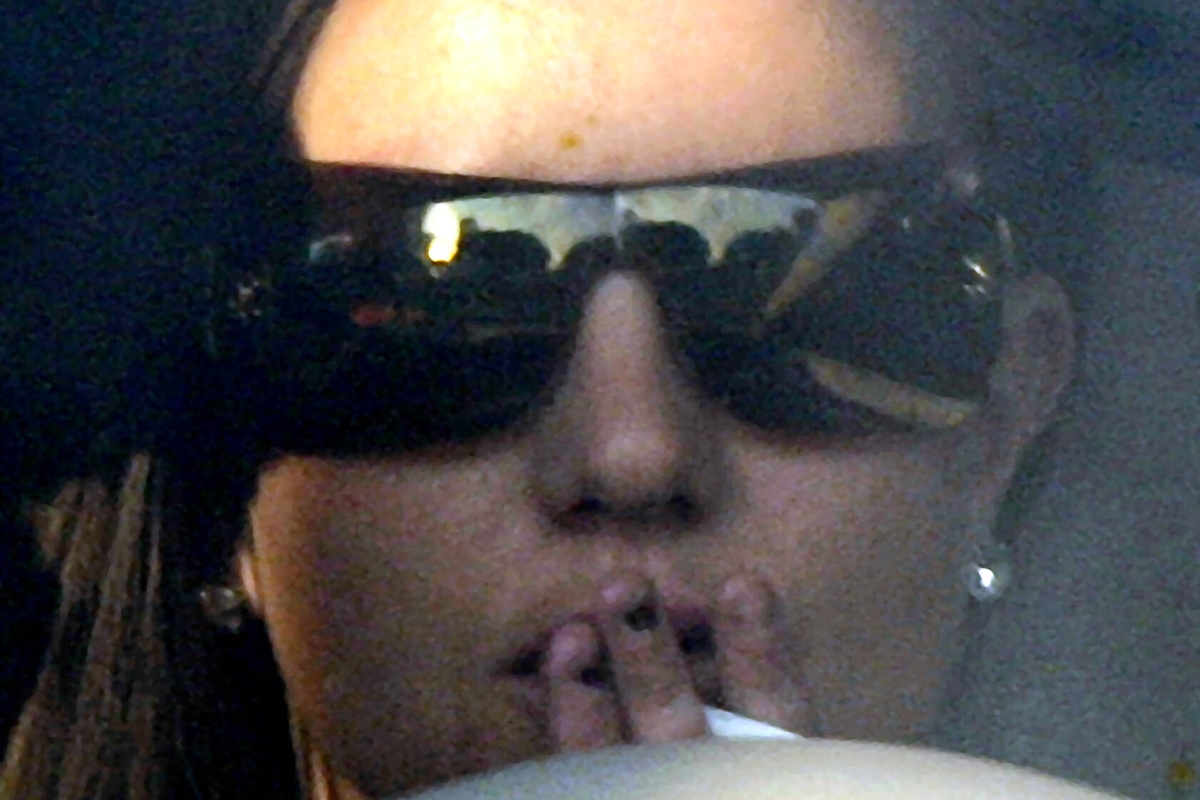 Britney Spears rauchend am Steuer auf einer Paparazzi-Aufnahme, 2007